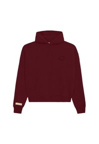 Felpa corta color bordeaux con tasca frontale a forma di canguro, piccolo design circolare ricamato in nero sul petto sinistro e etichetta beige sul polsino sinistro.