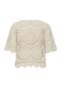 Haut court en dentelle crochet crème à manches courtes avec motifs floraux circulaires et géométriques, bordure à festons aux ourlets et aux manches.