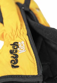 Yellow insulated jacket interior with black lining. Features embroidered "refresh kids" logo. Visible zipper and textured fabric.
