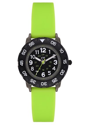 Black analog watch with bold white numerals on a round face, green accents, and a flexible bright green silicone strap.