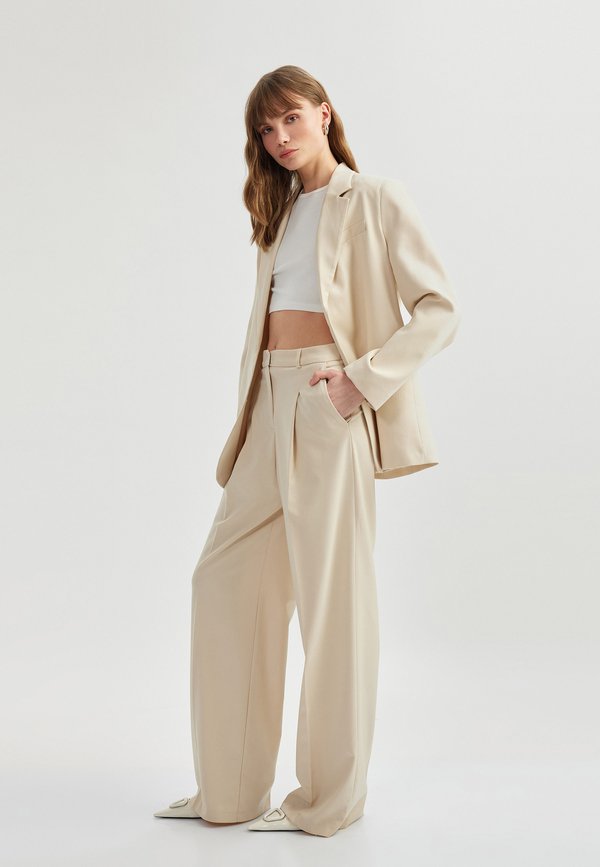 WIDE - Stoffhose - beige