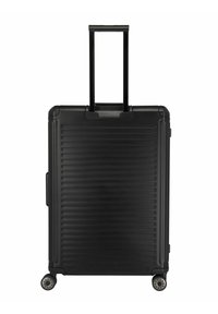 Schwarzer Hartschalenkoffer mit vertikaler Rillenstruktur, ausziehbarem Griff und vier Rädern. Robustes Material mit seitlichem Griff zum Anheben.