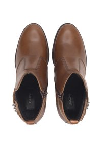 Hnědé kožené kotníkové boty s hladkým povrchem, zaoblenou špičkou, bočními zipy a měkkou vnitřní podšívkou pro pohodlí. Jednoduchý design, bez vzorů.