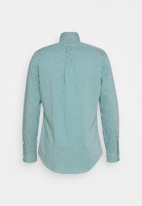 Grön och vit rutigt långärmad skjorta med klassisk krage, bakre yoke och knappade manschetter. Bomullsmaterial med en mjuk textur.