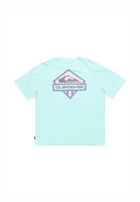 Mint green short-sleeve t-shirt featuring a large diamond-shaped graphic on the back with mountain and wave designs, and "Quiksilver" text.