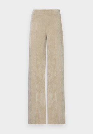 Høyt midjefot, vide ben i lys beige cordfløyel, med vertikal ribbing og en myk tekstur. Flat liv for komfort.