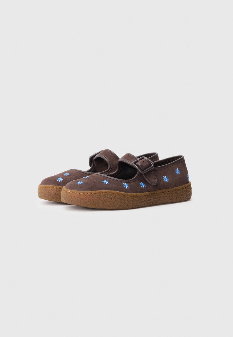 Brown suede shoes with blue floral embroidery, round toe, and a strap with a buckle, set on a textured gum sole.
