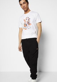 Ellesse INNES - Cargobukse - black