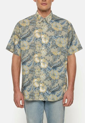 Kurzärmliges Button-up-Hemd aus hellbeigem Stoff mit blauen und gelben Blumenmustern, einem Kragen und einer Brusttasche.