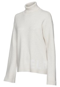 Cremefarbener Rollkragensweater aus weichem Material, mit gerippten Bündchen und Saum sowie einem dezenten Textmuster am unteren Rand. Lässiger Schnitt.