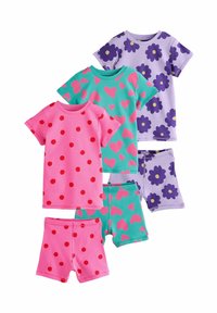 Set di pigiami colorati per bambini: rosa con pois rossi, verde con cuori rosa e viola con motivi floreali; materiale in cotone.