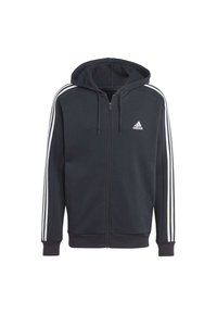 Felpa nera con zip in tessuto morbido, dotata di cappuccio con coulisse, righe bianche sulle maniche e logo Adidas bianco sul petto.