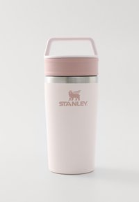 STANLEY stainless steel travel mug, light pink body, removable pink lid with handle, silver accent at the base, matte finish, logo displayed.