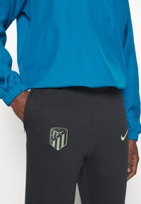 Nike Performance ATLETICO MADRID PANT THIRD - Joukkuetuote - black/oil green