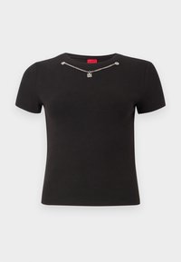 Black short-sleeve ribbed top with scoop neckline and silver chain detail featuring a small "HUGO" pendant.