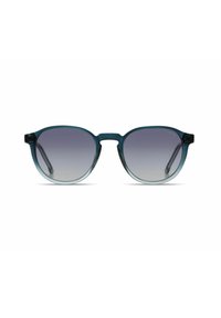 Ronde zonnebrillen met een transparante teal kleurenschema, gradiënt grijze lenzen en slanke pootjes. Minimalistisch ontwerp zonder zichtbaar logo.