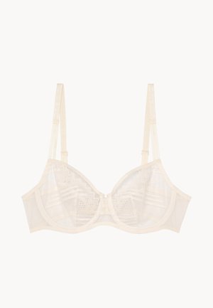 Soutien-gorge avec armatures en tissu transparent beige clair, orné de motifs en dentelle géométrique et de bretelles ajustables. Il dispose d'une bande satinée lisse et de bonnets minimalistes.
