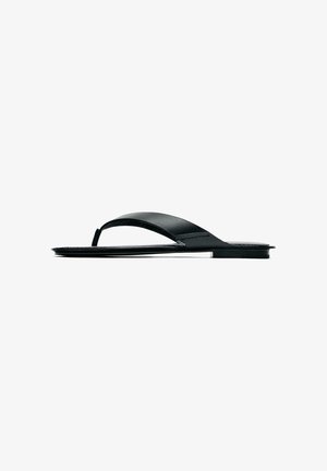 Black flat flip-flop sandal with a single wide strap and toe post on a white background.