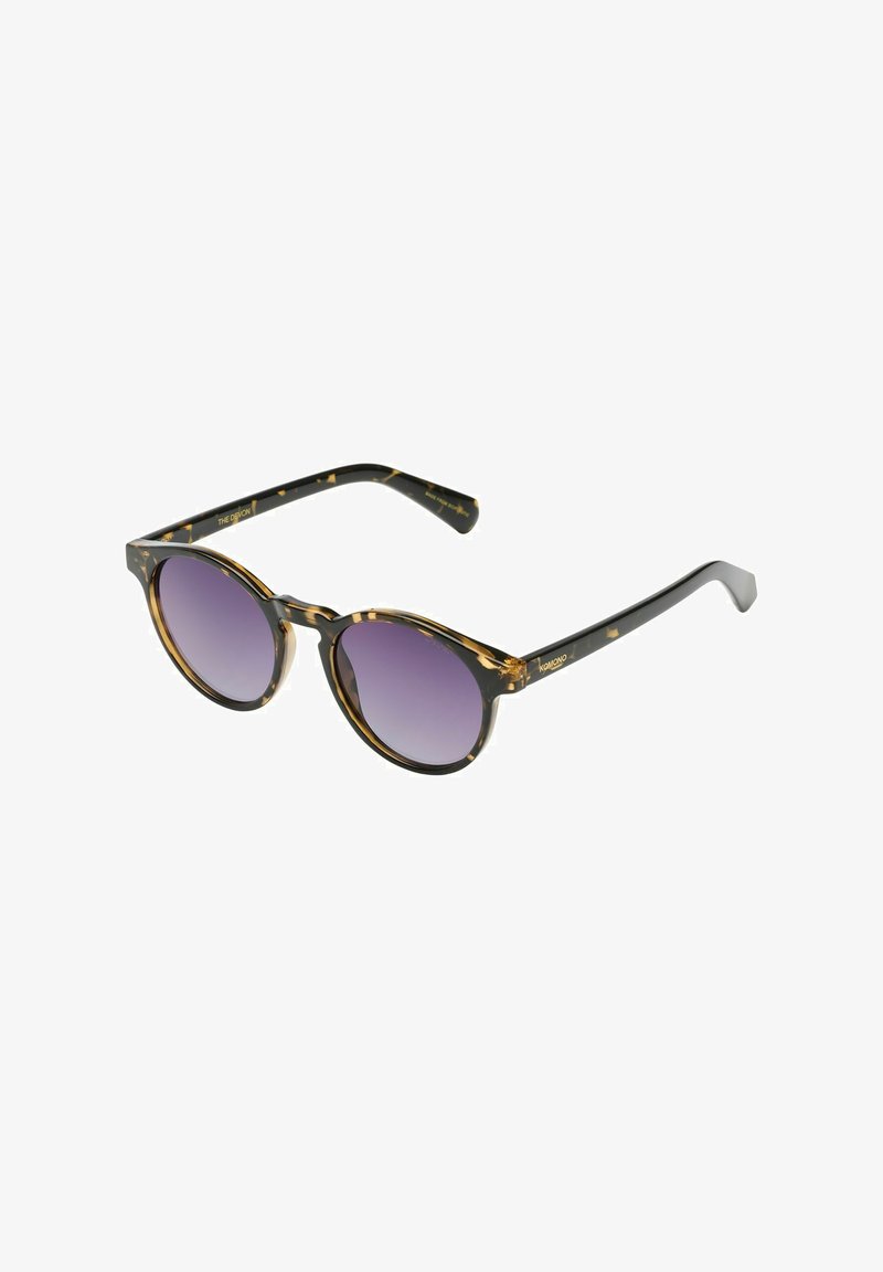 Lunettes de soleil rondes avec une monture en écaille noire et marron, des verres dégradés violets et des branches fines noires, ornées d'un détail de logo doré.