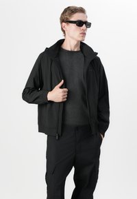 Calvin Klein Vodotesná bunda - black
