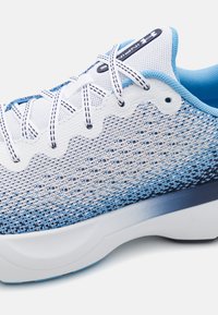 Lightweight athletic shoe with a blue and white mesh upper, textured design, and a thick white midsole. Features traditional lacing system.