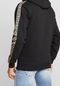 Glorious Gangsta Jersey con capucha - black