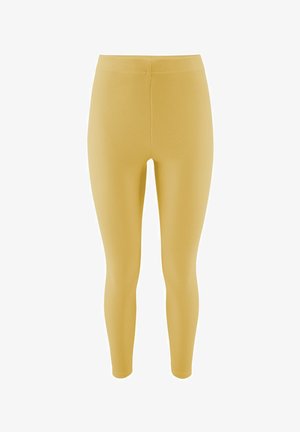 Żółte ribbed legginsy z wysokim pasem. Gładka tekstura i dopasowany krój, sięgające do kostki, zapewniają lekkie uczucie.