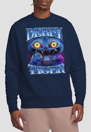 Dunkelblaues Sweatshirt mit einem cartoonhaften Grafikdesign, das eine blaue Katze mit übertriebenen Merkmalen, den Text "DERPY TIGER" und andere bunte Charaktere zeigt.