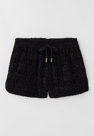 Zwarte shorts met een fluweelachtige textuur, voorzien van een overal ingezoomd Versace-logo, elastische tailleband en een bijpassend trekkoord.