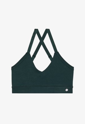 Dark green sports bra with a V-neck design, crisscross straps, and soft fabric. Features a small logo in the lower right corner.