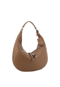 Woven leather hobo bag in tan, featuring a curved silhouette, adjustable strap, and a decorative leather tag with logo.