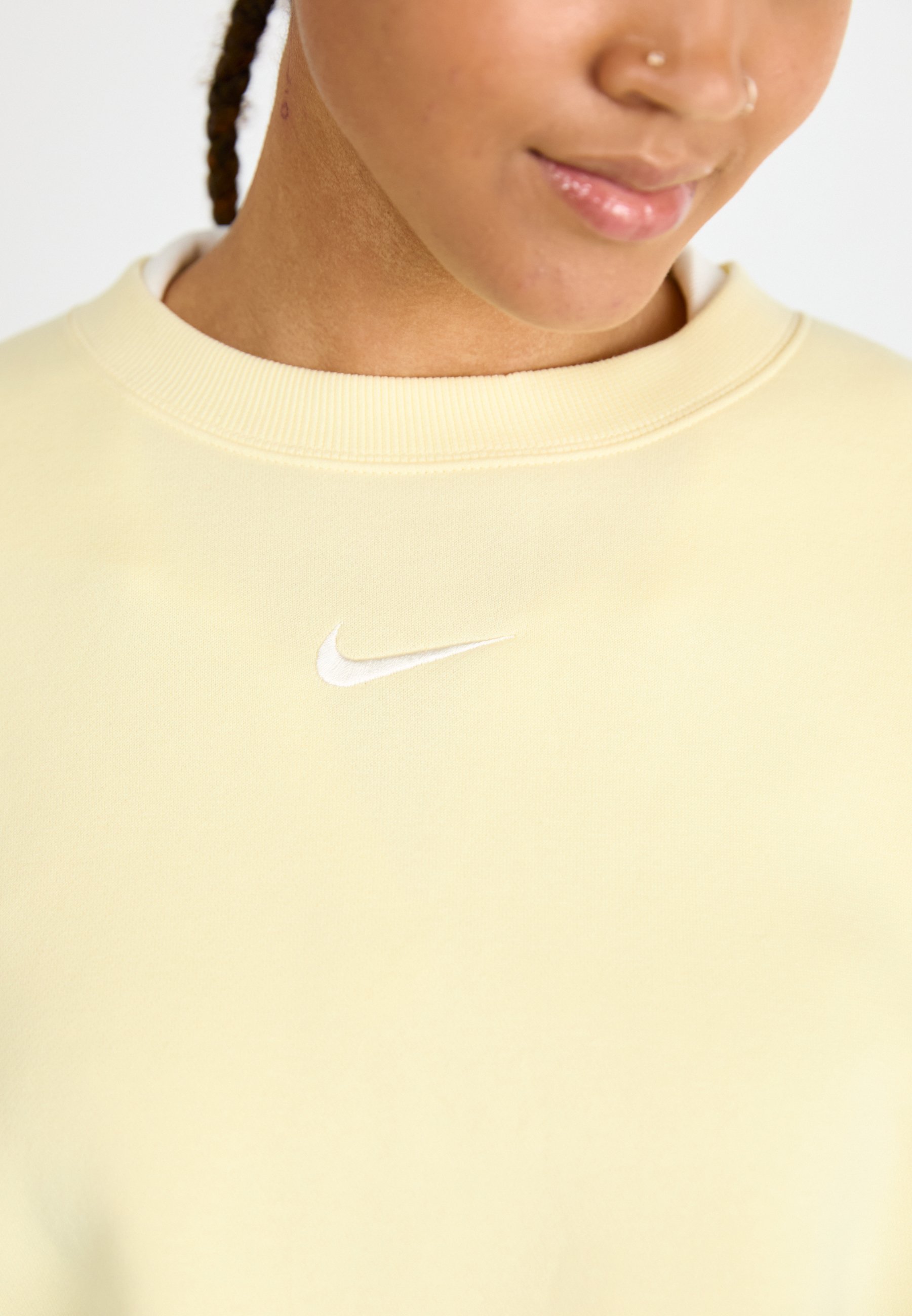 pastel yellow nike crewneck