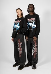 Wasted Paris CASPER PANT BLIND UNISEX - Relaxed fit jeans - faded black