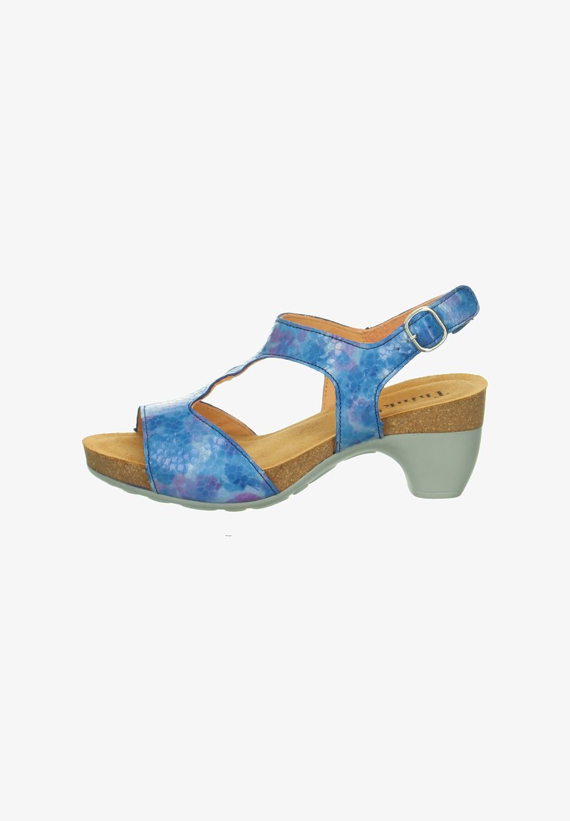 Blaue und lila gemusterte offene Sandale mit Kork-Insole, Knöchelriemen und niedrigem Absatz. Verfügt über ausgeschnittene Bereiche im oberen Teil.