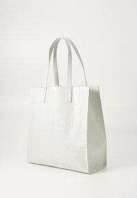 White faux leather tote bag with a textured crocodile pattern, rectangular shape, and dual flat handles. Smooth finish and structured design.