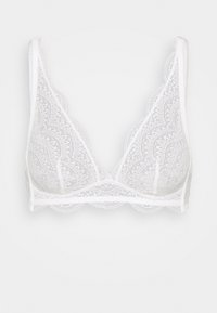 Hvit blonde-bustier med bølgete kanter, som har intrikate blomsterdesign og myk tekstur. Justerbare stropper med trekantet fasong.