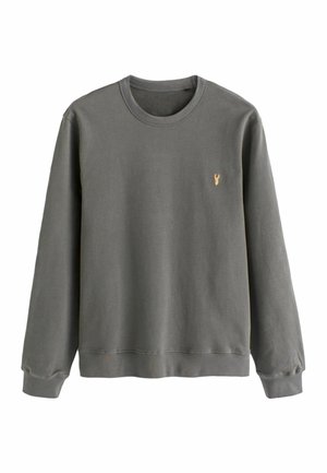 Grijze katoenen sweatshirt met lange mouwen, geribbelde halslijn en manchetten, voorzien van een klein gouden borduursel op de borst.
