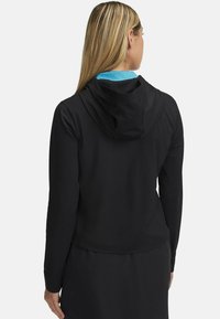 Black hooded jacket featuring a smooth texture, fitted design, and a contrasting blue interior lining. Sleeves are long with a tailored fit.