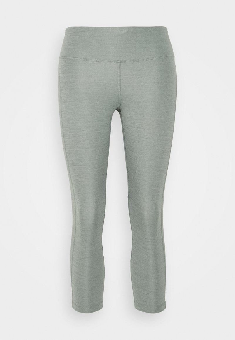Lys grønn cropped tights laget av elastisk materiale. Har høy midje og en glatt, teksturert overflate uten synlige mønstre.