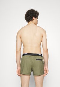 Puma SWIM MEN LOGO - Fürdőnadrág - moss green