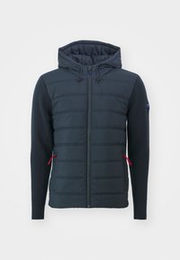 - Kurtka przejściowa