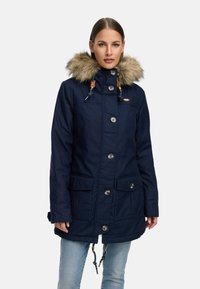 Navy blue parka with faux fur hood, large front pockets, and wooden toggles. Features a button-down front and adjustable drawstring waist.