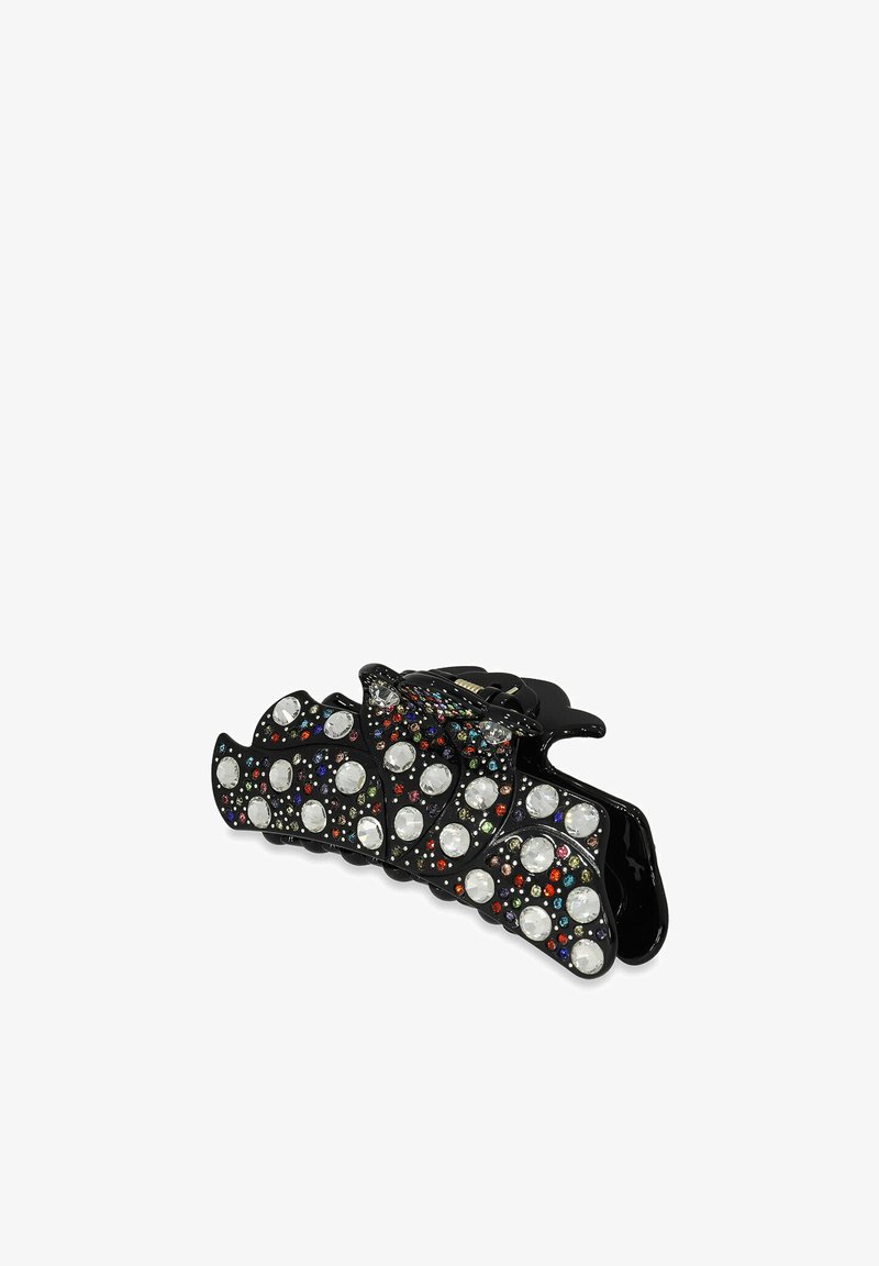 Fermaglio per capelli nero con strass multicolori e grandi pietre chiare. Design ondulato con un finitura lucida. Dimensioni compatte per un facile utilizzo.