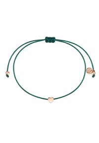 Regulējams rokassprādze ar zaļu cord, kuras centrā ir mazs, pulēts rozā zelta sirds piekare un slīdēšanas mezgla aizdare.