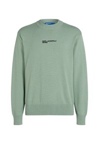 Lys grøn strikket sweater med rund hals, lange ærmer, ribbede manchetter og kant; har sort "KARL LAGERFELD JEANS" branding på forsiden.