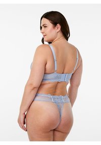 Light blue lace bralette and thong set. Features adjustable straps, scalloped edges, and keyhole back detailing. Delicate lace texture.