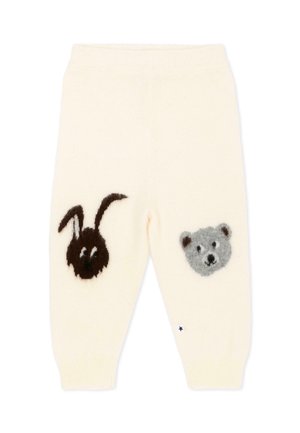 Pantalones de bebé de color crema con cara de conejo negro peludo en la pierna izquierda y cara de oso gris en la pierna derecha.