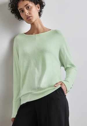 Shirt mit breiten Bündchen
