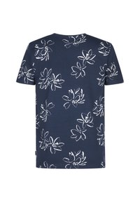 T-shirt en coton bleu marine avec imprimé floral blanc, manches courtes et col rond. Le motif est répété sur le dos.