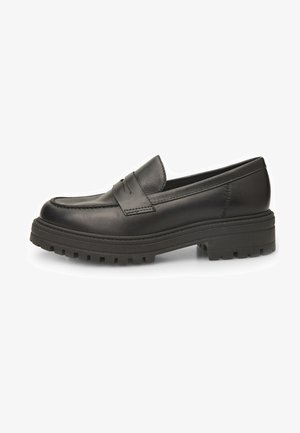 Mocassins en cuir noir avec un bout arrondi, des coutures proéminentes et une semelle en caoutchouc crantée pour une meilleure traction. Design classique à enfiler.
